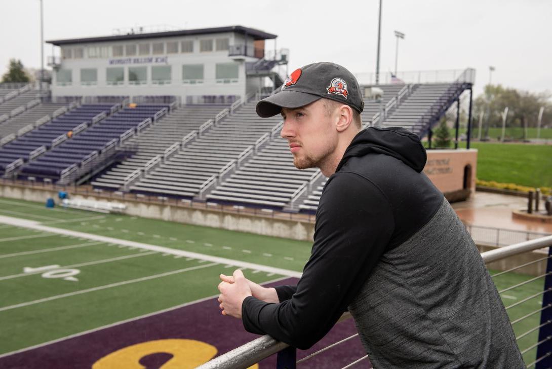 Sports 管理 student looking over the Ashland University football field